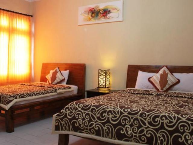 фотографии отеля Gong Segara Homestay изображение №3