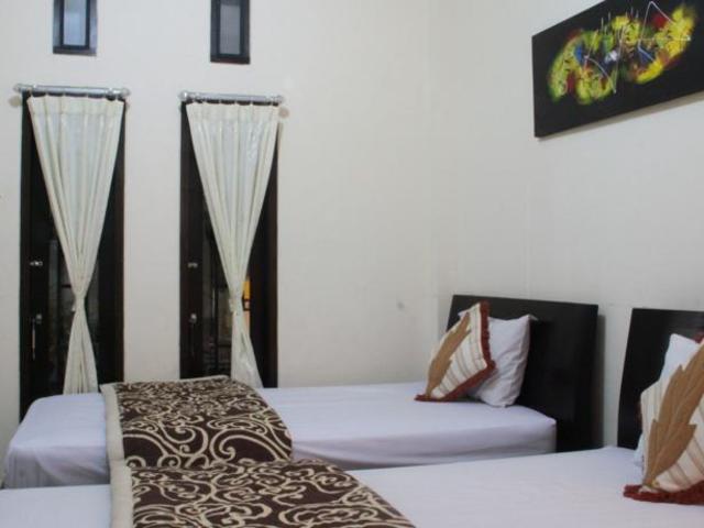 фотографии Gong Segara Homestay изображение №8