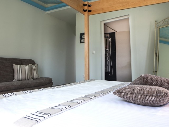 фото Psarou Beach изображение №6