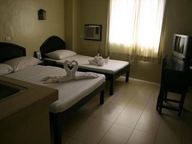 фото отеля Sampaguita Suites Plaza Garcia изображение №17