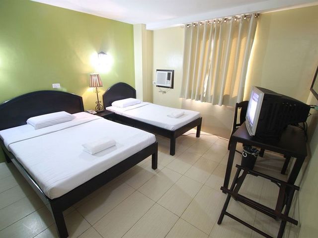 фотографии Sampaguita Suites Plaza Garcia изображение №12