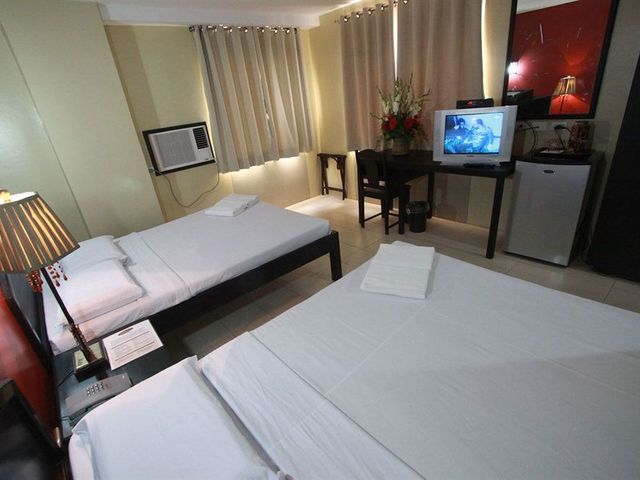 фото Sampaguita Suites Plaza Garcia изображение №10