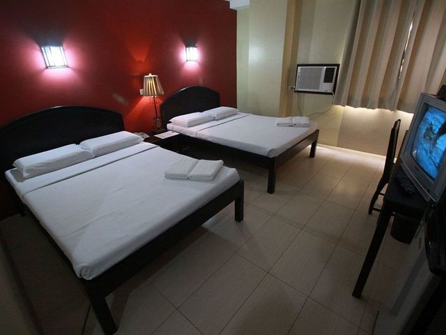 фотографии отеля Sampaguita Suites Plaza Garcia изображение №7