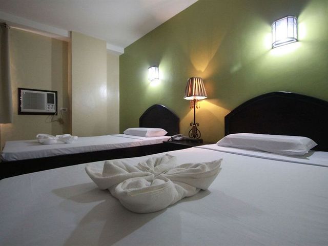 фотографии Sampaguita Suites Plaza Garcia изображение №4