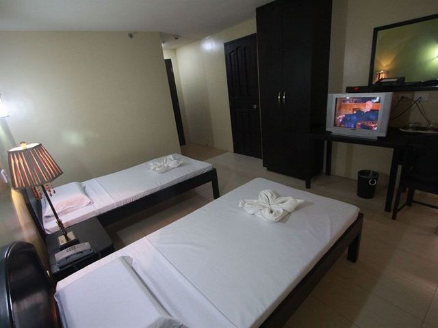 фотографии отеля Sampaguita Suites Plaza Garcia изображение №3