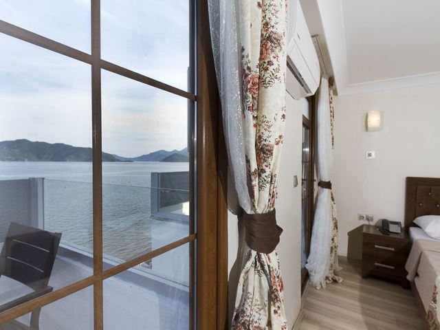 фотографии отеля Reis Beach Hotel изображение №11