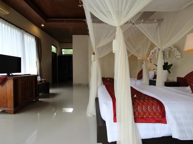 фото отеля Putri Ayu Cottages изображение №9