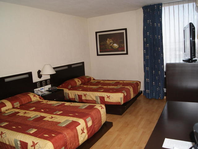 фотографии отеля Howard Johnson Plaza Hotel Las Torres изображение №19