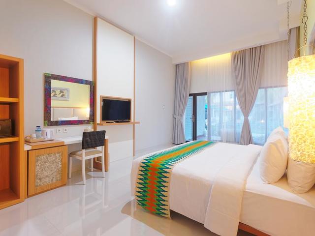 фотографии отеля Jambuluwuk Oceano Resort изображение №7