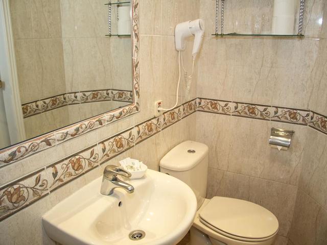 фотографии отеля Hostal Los Alpes изображение №15