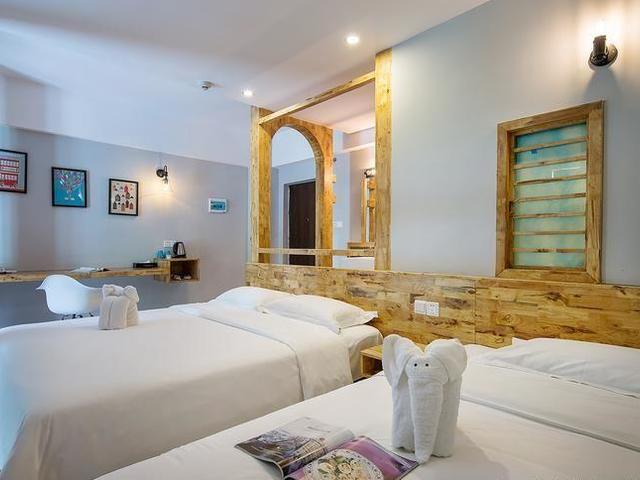 фотографии отеля Sanya Jiantu 87 City Inn изображение №7