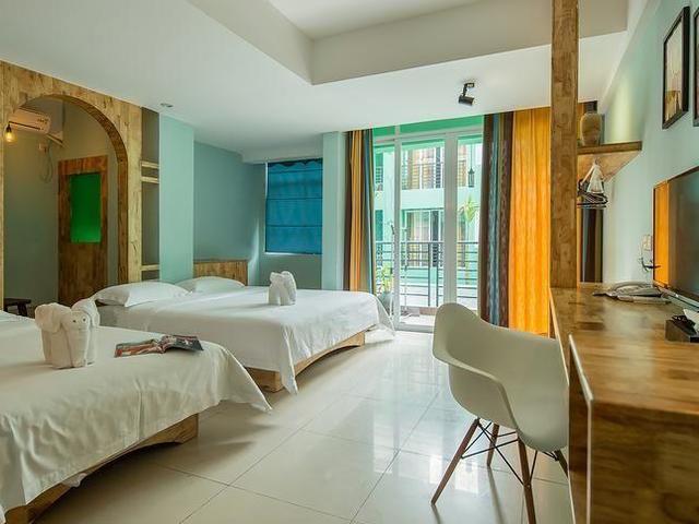 фото отеля Sanya Jiantu 87 City Inn изображение №5