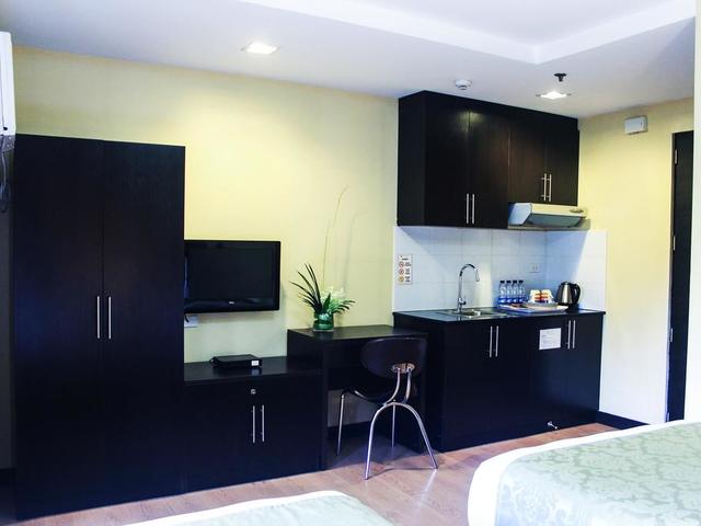 фотографии The Studio 18 Residences изображение №12