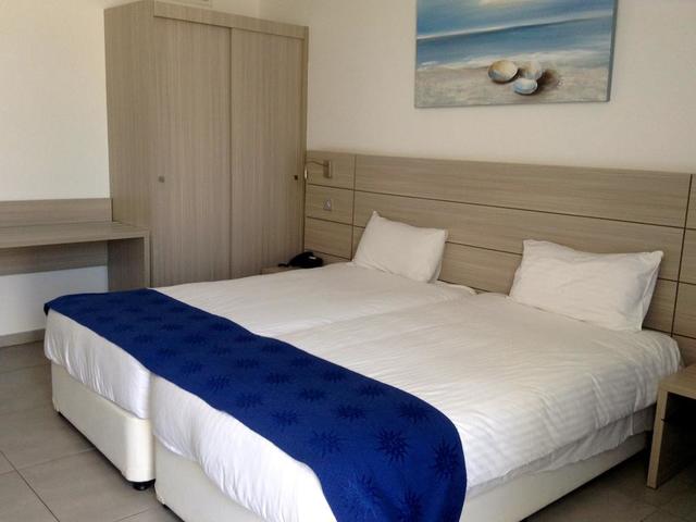 фотографии Limanaki Beach Hotel & Suites изображение №40