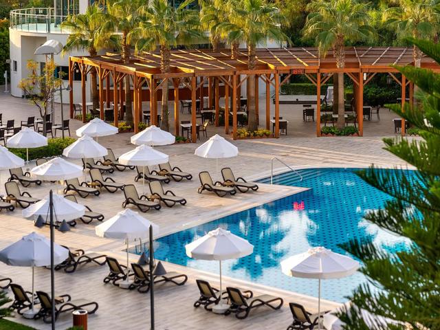 фотографии отеля Commodore Elite Suites & Spa изображение №43