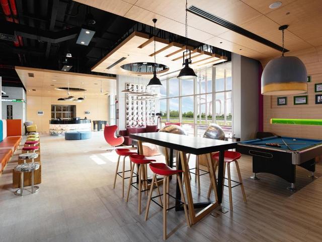 фотографии отеля Aloft Dubai South изображение №7