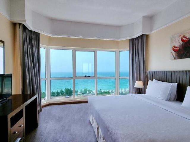 фотографии Ramada by Wyndham Beach Hotel Ajman (ex. Landmark Suites Ajman; Coral Suites) изображение №8