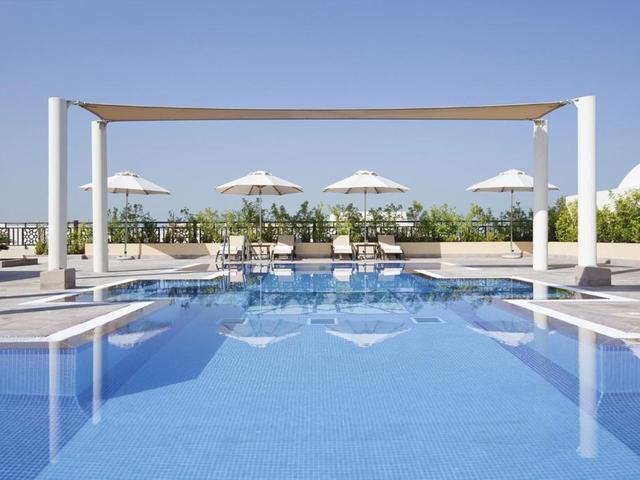 фото отеля Movenpick Hotel Apartments Al Mamzar Dubai (ex.Moevenpick The Square Dubai) изображение №1