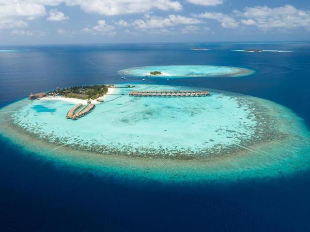 фотографии отеля Outrigger Maldives Maafushivaru Resort изображение №47