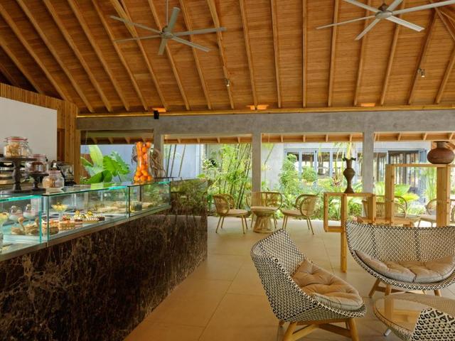 фото отеля Outrigger Maldives Maafushivaru Resort изображение №25