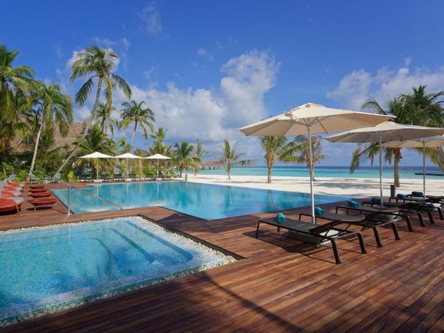 фотографии отеля Outrigger Maldives Maafushivaru Resort изображение №19