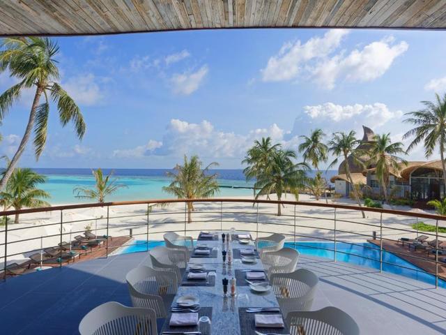 фотографии отеля Outrigger Maldives Maafushivaru Resort изображение №11