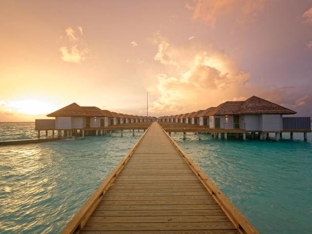 фотографии отеля Outrigger Maldives Maafushivaru Resort изображение №7