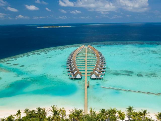 фотографии отеля Outrigger Maldives Maafushivaru Resort изображение №3
