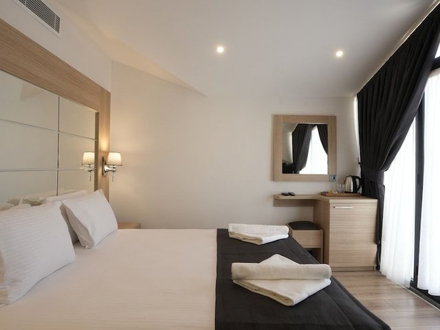 фотографии отеля Alesta Seaside Residence изображение №23