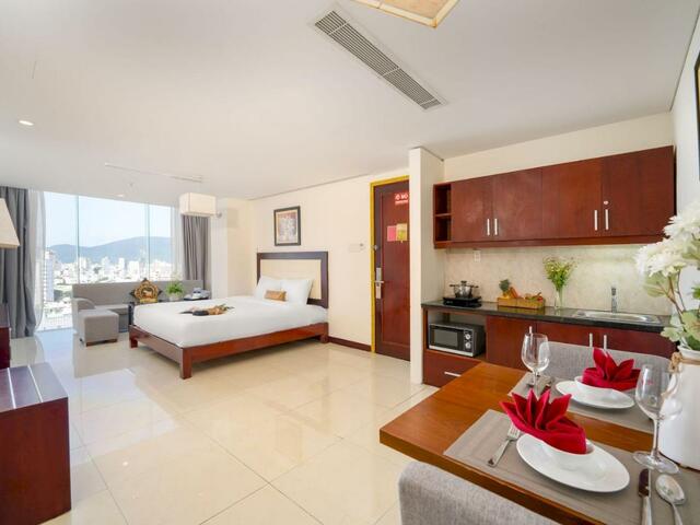 фотографии Capital O 1176 Gemma Hotel & Apartment изображение №24