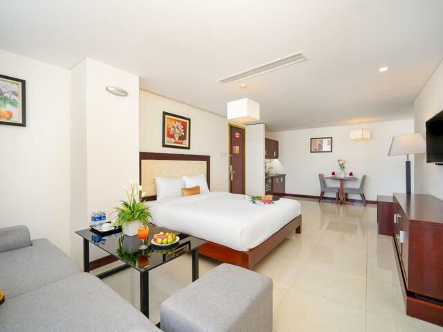 фотографии Capital O 1176 Gemma Hotel & Apartment изображение №16