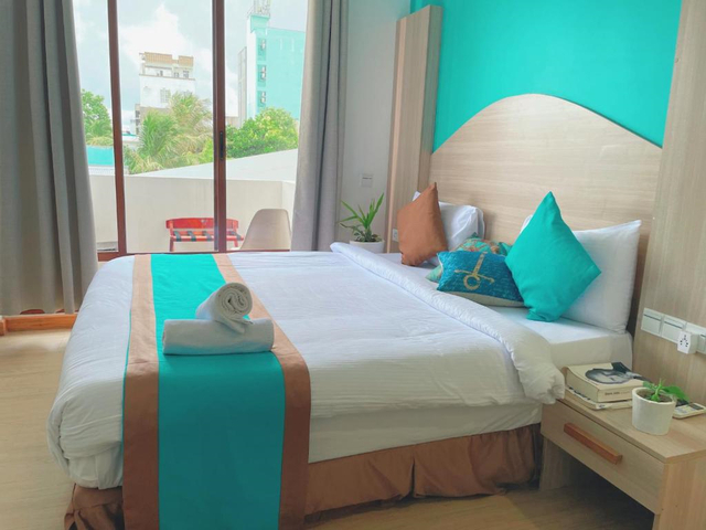 фото отеля Kue Hotels (ex. Aquzz inn Maafushi; Beachwood Maafushi) изображение №9