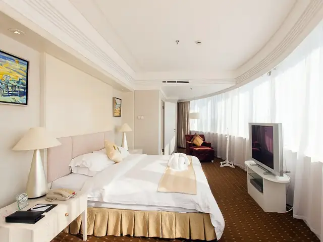 фото Haikou Tianyou Hotel (ex. Tienyow Grand Hotel; Huayun Gloria Grand Hotel Haikou) изображение №2