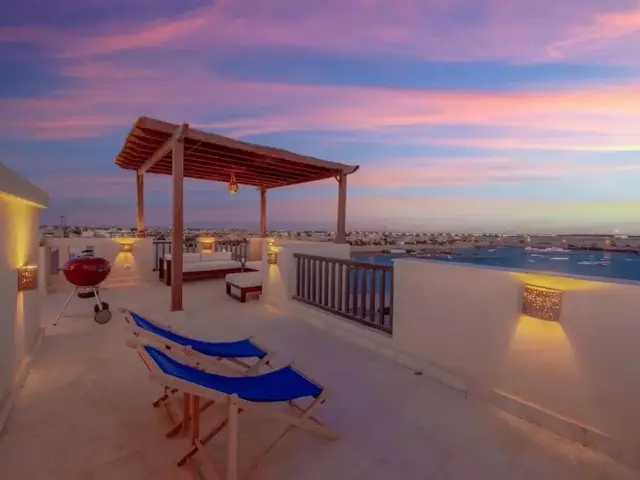фотографии отеля Sunny 2 Bedroom + Private Roof Terrace Lagoon View изображение №3