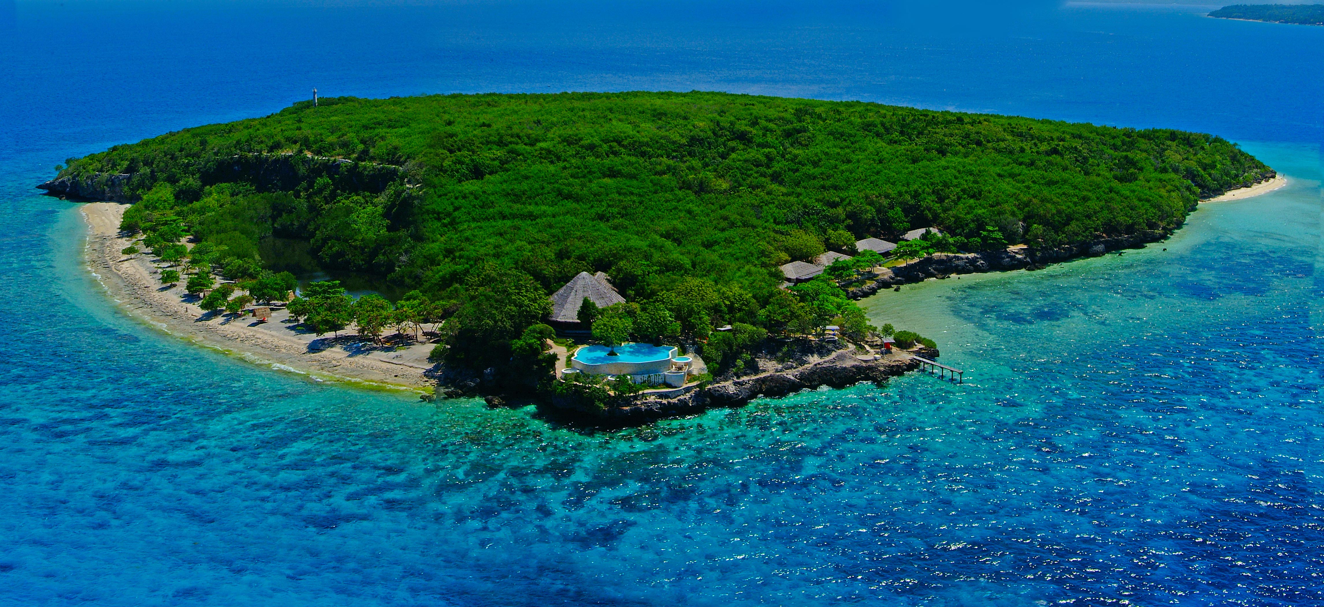 Остров филиппинского архипелага. Себу остров самолет. Pescador Island. Необитаемые острова Филиппин купить. Фангуо фото.