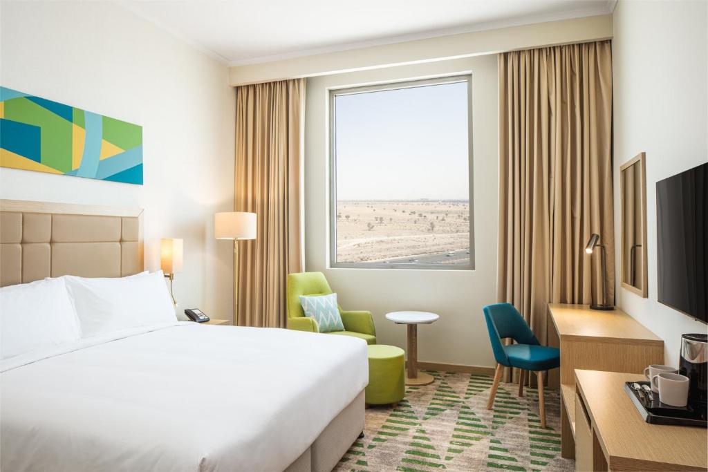 Dubai science park. Отель Holiday Inn Santiago море. ВОКО Дубай отель 4 звезды. Park Inn Dubai. Отель Park Inn Рига логотип.